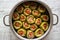 Biber Dolmasi / Turkish Stuffed Peppers in a pan.