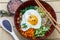 Bibimbap in a bowl, korean dish top view