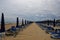 Bibione beach Italy with clear blue sky and sun umbrellas