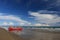 Bibione beach Italy with clear blue sky and sun umbrellas