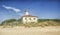 Bibione Lighthouse on the beach in Italy