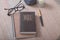 Bible and glasses on the table in the home interior. Bible study concept