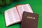 Bible Indonesian Language Alkitab Close and Open Version stacking each other Green Background