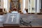 The Bible on the table of a prayer bench in the church