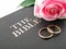 Bible, Wedding Rings and Rose