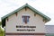 Bibliotheque municipale sign french text on facade of Old French Village Building