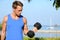 Bicep curl - weight training fitness man outside