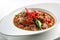 Bicol express - a spicy stew with pork, shrimp paste, and chilies, generative AI Filipino dish