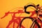 Bicycle Abstract with strong shadow on yellow wall background. art image.