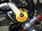 Bicycle bell painted yellow with written word Boom