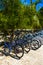 Bicycle Bicycles bike bikes parked at the beach entrance Mexico