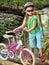 Bicycle children with ladies bikes in summer park.