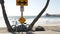 Bicycle cruiser bike by ocean beach, California coast USA. Summer cycle, road sign, waves and pier.