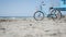 Bicycle cruiser bike by ocean beach California coast USA. Summer sea shore. Cycle by lifeguard tower