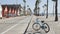 Bicycle cruiser bike by ocean beach, California coast USA. Summertime cycle, cottages and palm tree.