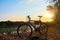 A bicycle at dawn near the pond. outdoor exercise