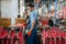 Bicycle factory, worker holds pink kid`s bike fork