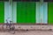 Bicycle in front of geen door,Nyaung Shwe in Myanmar (Burmar)