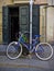 Bicycle in front of a picturesque door in Born neighborhood, Barcelona.