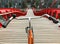 Bicycle handlebar POV view. Orange bike on the wooden red Python bridge in Amsterdam, Netherlands