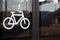Bicycle icon on automatic glass bus door