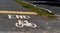 Bicycle lane end sign on a shared used footpath next to road