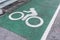 Bicycle Lane Marked in Green with Painted Symbols on park