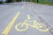 Bicycle lane with yellow marking on the ground in Switzerland.