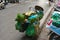 Bicycle loaded with groceries and gum boots on top. Vietnam street life