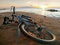 Bicycle lying on the beach