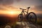 Bicycle on mountain top at sunset, landscape with sports bike, generative AI