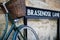 Bicycle Next To Brasenose Lane Sign Outside Oxford University Co