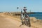 Bicycle parked on Scheveningen harbour entance wall