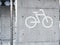 Bicycle parking sign on cement wall Public Building Signage