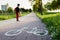 Bicycle path with horizontal marking. Designated place for cycling.