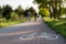 Bicycle path with horizontal marking. Designated place for cycling.