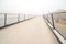 Bicycle pedestrian bridge with fog