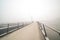 Bicycle pedestrian bridge with fog