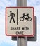 Bicycle and pedestrian lane road sign on pole post, bike cycling