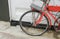 Bicycle red vintage near of wall