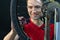 Bicycle repair. Rear wheel and tire closeup. Mechanic repairing spokes of the rear wheel of a mountain bike. Bike mechanic in the