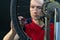 Bicycle repair. Rear wheel and tire closeup. Mechanic repairing spokes of the rear wheel of a mountain bike. Bike mechanic in the