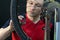 Bicycle repair. Rear wheel and tire closeup. Mechanic repairing spokes of the rear wheel of a mountain bike. Bike mechanic in the