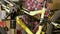 A bicycle repair technician installs a bicycle on a repair stand in a bicycle repair shop. Bicycle repair