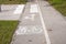 Bicycle road sign and arrow, path for bike in the city.