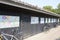 Bicycle shed with art on the wall