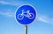 Bicycle sign for bikes lane against the sky