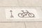 Bicycle signs on the bicycle way in Park. Bicycle lane for bike rider.