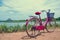 The bicycle stands on a village road at Thalkote lake near Sigiriya
