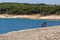 Bicycle on stony beach, Kamenjak peninsula, Adriatic Sea, Premantura, Croatia